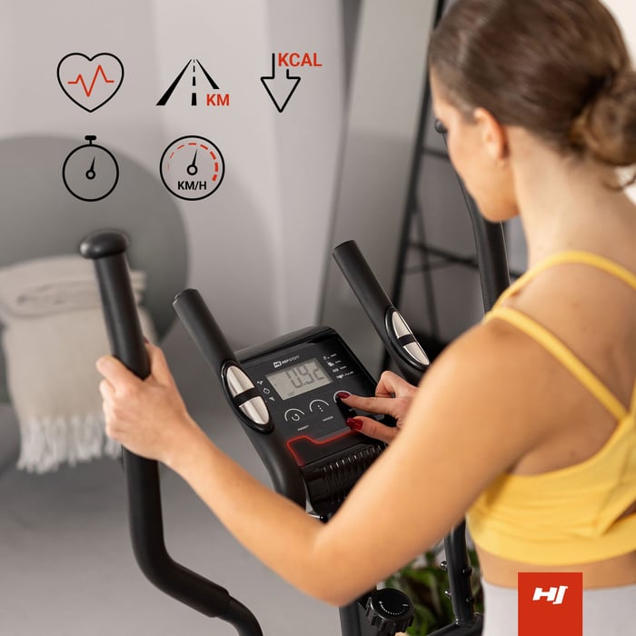 Trainingscomputer des Crosstrainers von Hop-Sport mit LCD-Monitor, zeigt Zeit, Geschwindigkeit, Distanz, ODO, Kalorien und Puls.