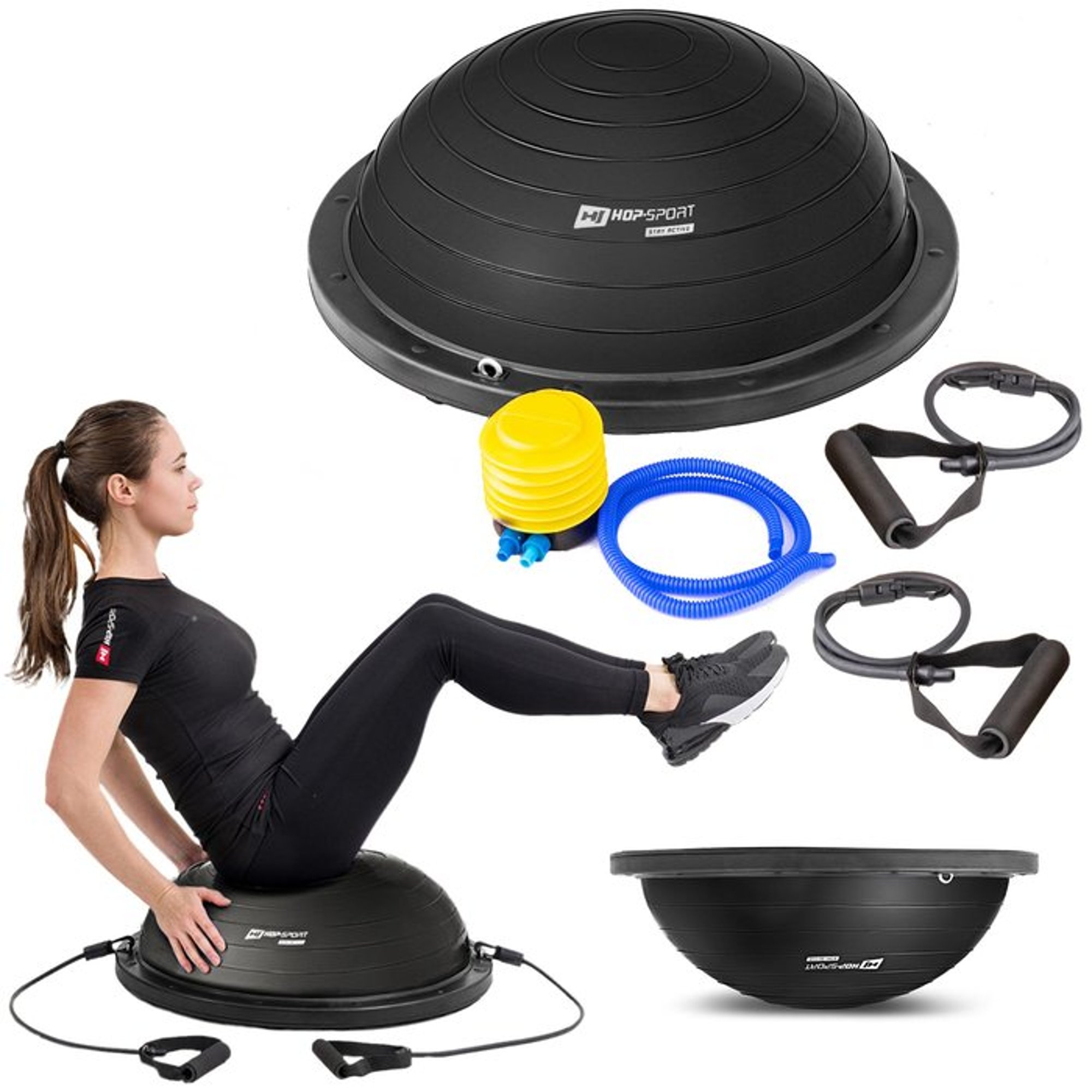 Eine Frau trainiert auf einem Balancetrainer von Hop-Sport