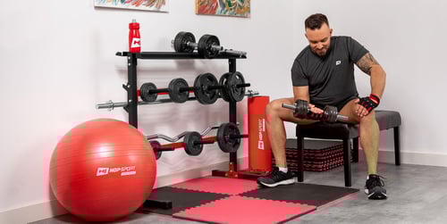 Freie Gewichte oder Maschinen: Was ist besser für den Muskelaufbau?