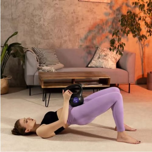 Glute Bridge mit Hop-Sport kettlebell für den Gluteus maximus